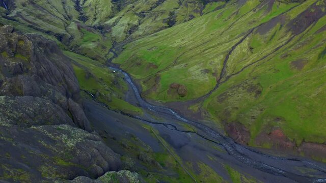 Mountainscape With Flowing River Valley At Seljavallalaug In Southern Iceland. Aerial Drone