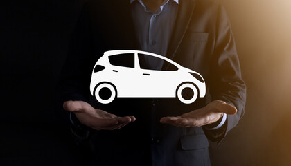 Digital composite of Man holding car icon.Car automobile insurance and car services concept....