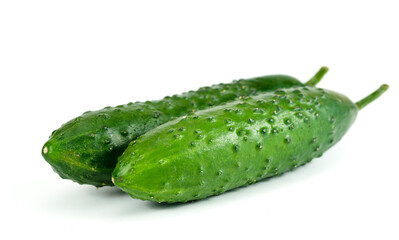 Two cucumbers on a white background.