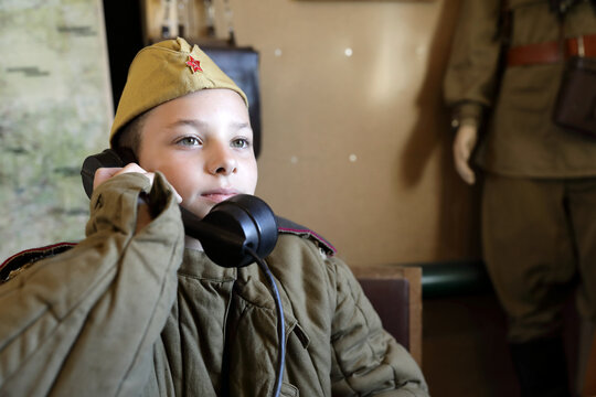 Boy In Uniform Of Red Army With Telephone Receiver