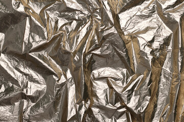 Crumpled gold paper texture background. Abstract background texture golden color crumpled foil.