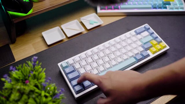 Footage of a person testing the acoustic sound from custom build mechanical DIY keyboard.
