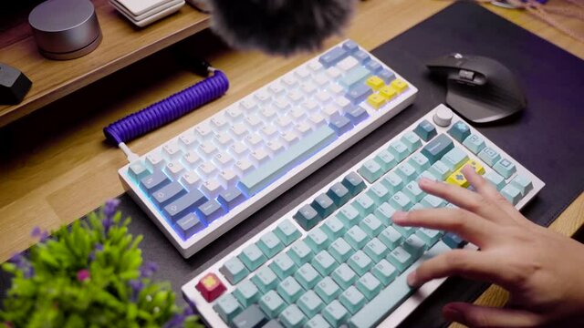 Footage of a person testing the acoustic sound from custom build mechanical DIY keyboard.