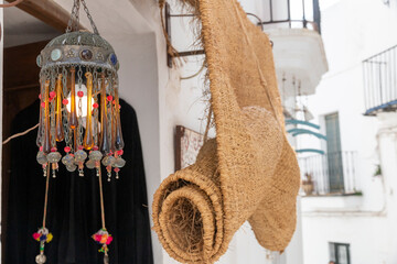 Colored crystal lamp. Decorative detail in a street in Vejer de la Frontera, Spain