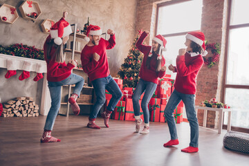 Photo of family enjoy discotheque have crazy inspiration fun celebrate new-year eve in decorated x-mas home indoors