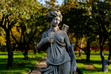 Statue godness Diana in the city park, atutumn landscape, Moscow, Kolomentskoe	