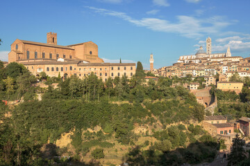 Fototapeta na wymiar Siena. Veduta della Basilica di San Domenico verso la Torre del Mangia e il Duomo
