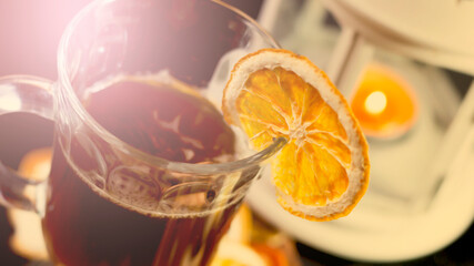 Hot tea with orange slices, fruit drink