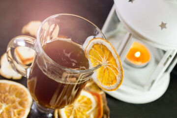 Hot tea with orange slices, fruit drink