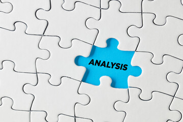 Fototapeta premium The word analysis written on missing puzzle piece.