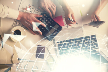 Double exposure of man and woman working together and world map hologram drawing. international...