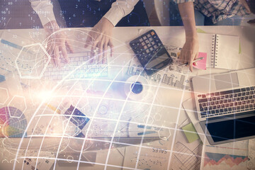 Double exposure of man and woman working together and world map hologram drawing. international network concept. Computer background. Top View.