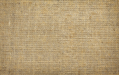 Brown canvas texture with real linen threads on canvas with beautiful linen texture on canvas as sample of classic brown linen canvas