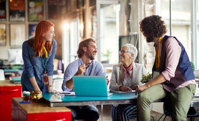 Group of young employees working together