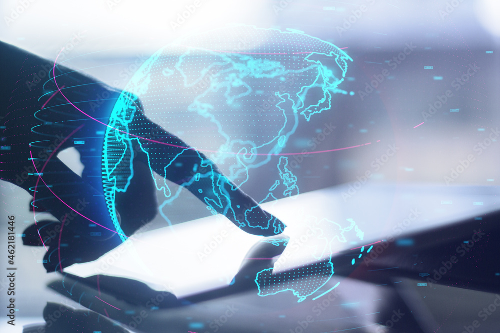 Poster Close up of hand using tablet at desktop with glowing digital blue globe hologram on blurry background. Internet, earth and future concept. Double exposure.
