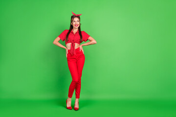Full length body size photo young woman wearing red outfit smiling looking copyspace isolated bright green color background