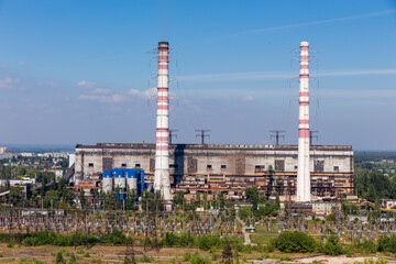 Fossil fuel thermal power station against the sky