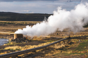 Fototapeta na wymiar Geothermal power plant generating steam