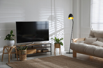 Living room interior with modern TV on stand