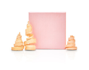 gift box and Christmas tree with added shadow and reflection on a white background