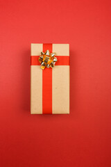 Craft gift on a red background. Flat style.