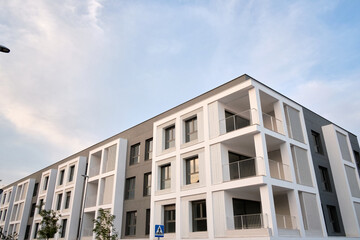 Fragment of modern residential apartment with exterior flat buildings. Detail of the new luxury house and residential complex.