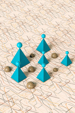 Spheres and blue pyramids on pattern