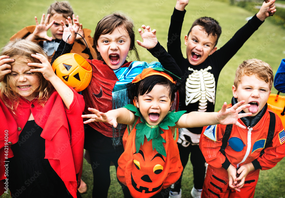 Wall mural little kids at a halloween party