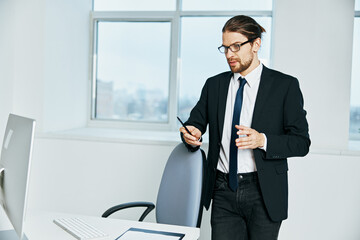 businessman near the desktop office computer technologies