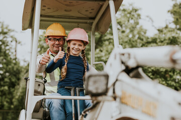 Contractor father and daughter at a construction site