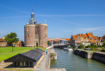 Historic city gate and lock in the old harbor of Enkhuizen, Netherlands