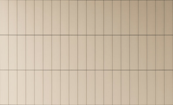 Background of beige long tiles with vertical lines