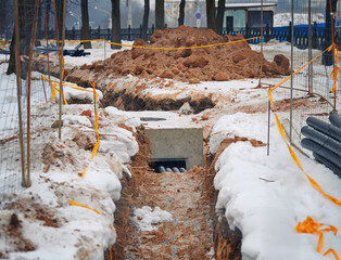Ground work, trench for city communication, fiber optical cables installation. Laying fiber optic...