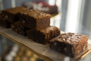 Cakes in the showcase refrigerator of cafe