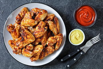 crispy fried chicken wings served on a plate © myviewpoint