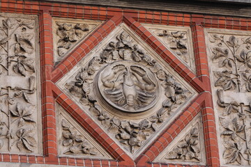 Amsterdam Stedelijk Museum Facade Sculpted Lobster with Foliage Close Up, Netherlands