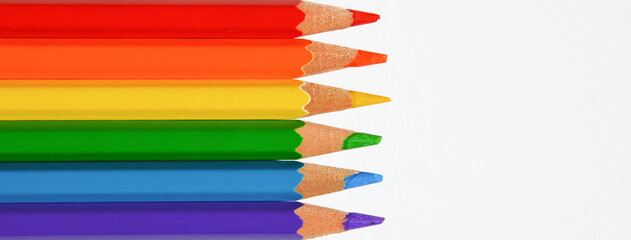 colored pencils of rainbow colors. red, orange, yellow, green, blue, purple pencils for drawing.