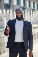 African american young man smiling and looking contented