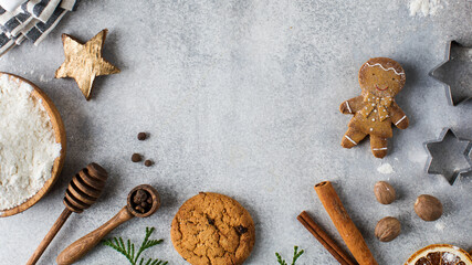  Christmas background with gingerbread, spices, flour. Copy space. New year concept.