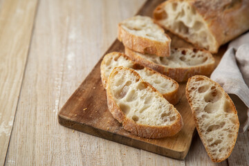 Ciabatta. Slices of freshly baked italian sour dough bread
