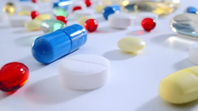 Macro shot of medications pills and tablets. Multicolored drugs Probe lens shot.