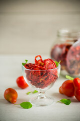 a handful of dried tomatoes and fresh tomatoes