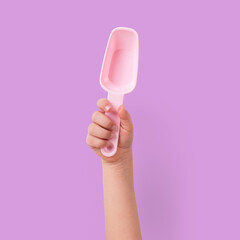 Kid holding trowel gardening tool