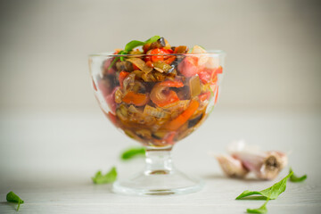 fried eggplants with peppers, tomatoes, onions and garlic