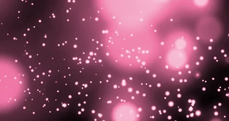 Crédence de cuisine en verre imprimé Lumière et ombre Image de plusieurs taches roses brillantes de lumière se déplaçant dans un mouvement hypnotique sur fond rose