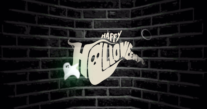 Image of happy halloween text on brick background