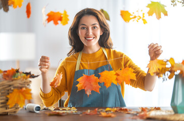 Woman doing autumn decor