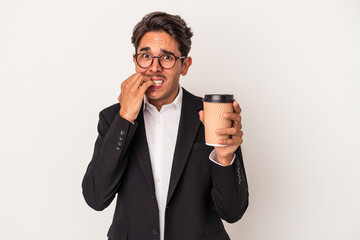 Young mixed race business man holding take away coffee  isolated on white background biting fingernails, nervous and very anxious.