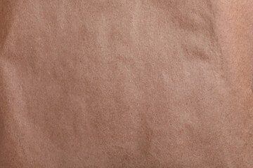 Texture of kraft paper bag as background, closeup