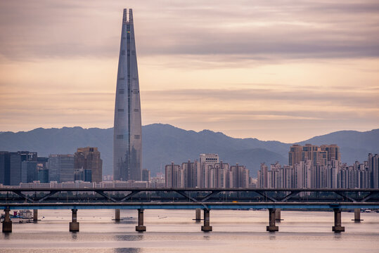Sunset view of Lotte World Tower skyscraper and Han river in Seoul South Korea